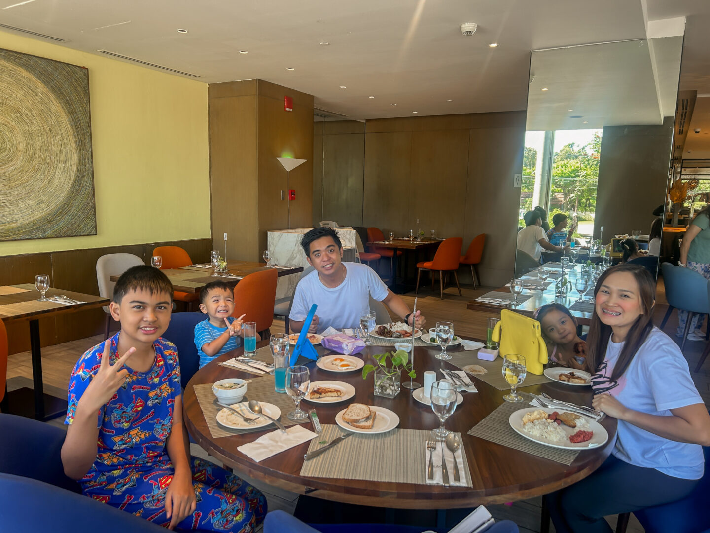 Breakfast buffet at acacia hotel with family