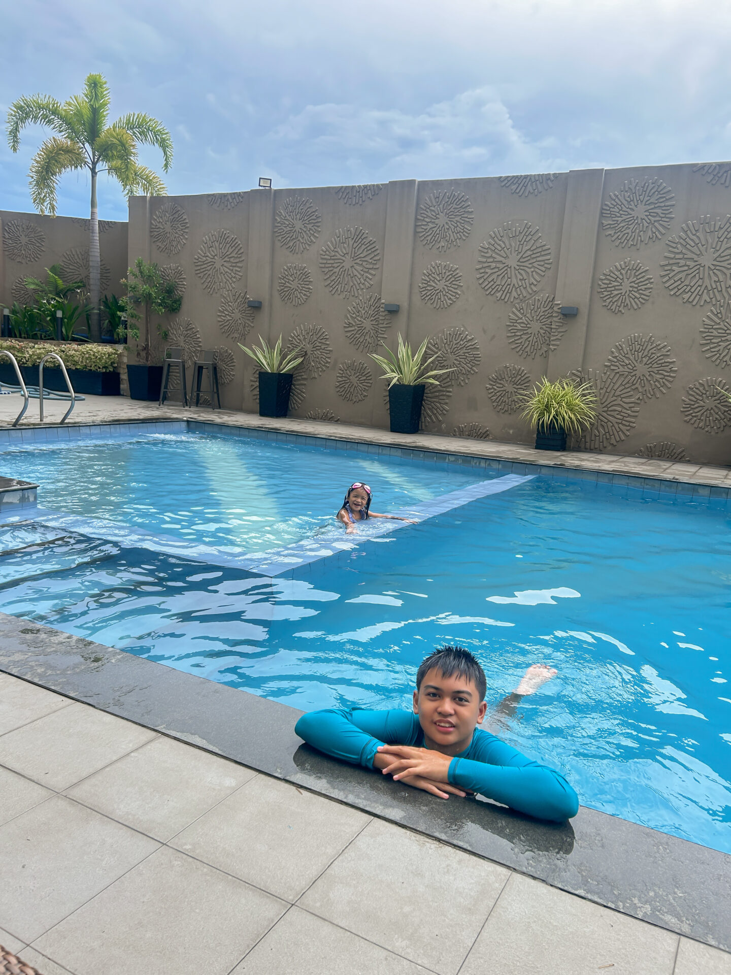 Pool at acacia hotel, kids enjoy swimming